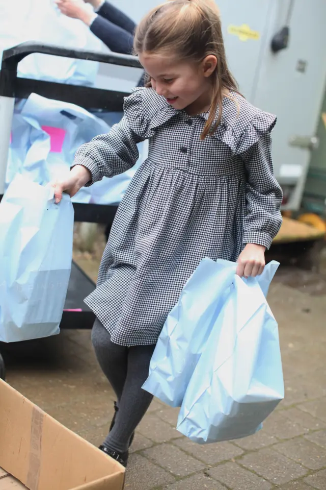 Princess Charlotte delivers food packages