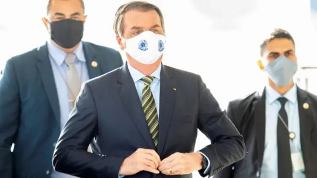 Jair Bolsonaro wearing a face mask