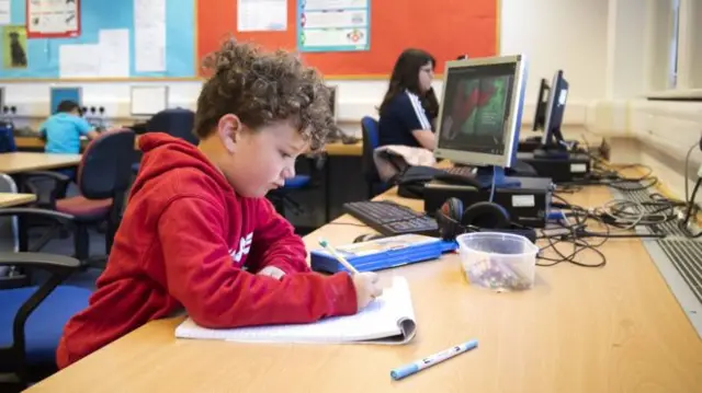 A pupil at a desk