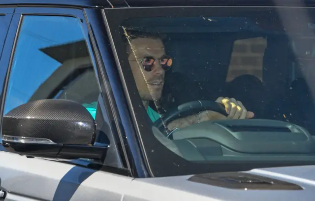 Liverpool's Jordan Henderson arrives at training