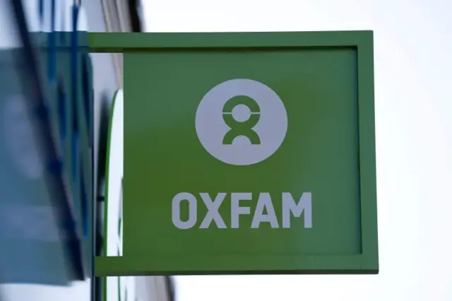 Oxfam signage is pictured outside a high street branch of an Oxfam charity shop in south London