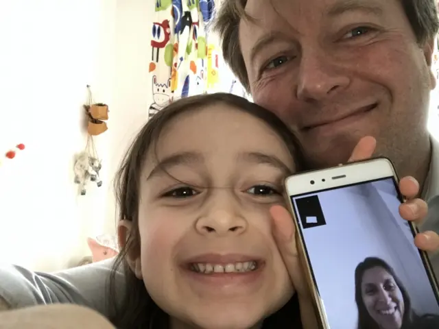 Richard Ratcliffe and his daughter Gabriella speak on the phone to Nazanin Zaghari-Ratcliffe. Photo: April 2020