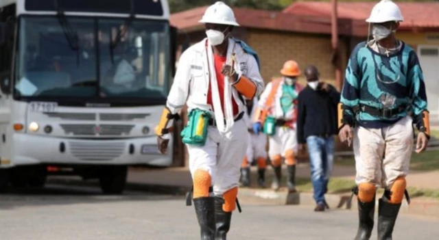 Miners wearing masks in South Africa during the coronavirus pandemic