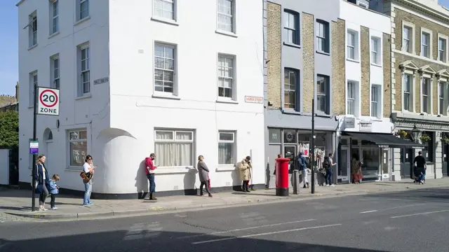 A queue in Stoke Newington Church Street, north London