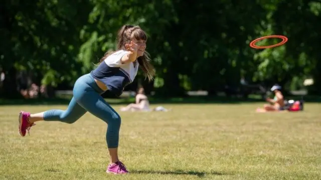 Woman playing frisbee