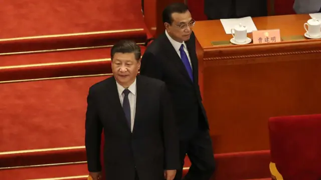 Chinese President Xi Jinping (left) and Chinese Premier Li Keqiang arrive at The Great Hall of People