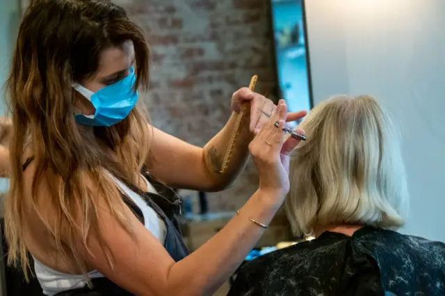 Hairdresser in mask