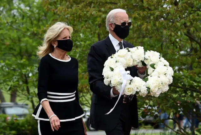 Democratic presidential candidate and former US Vice President Joe Biden with his wife Jill Biden, pay their respects to fallen service members on Memorial Day at Delaware Memorial Bridge Veteran's Memorial Park in Newcastle, Delaware, May 25, 2020