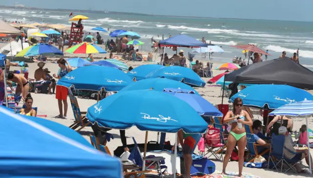 Cocoa Beach is packed with Memorial Day weekend beachgoers on Saturday, May 23, 2020, in Cocoa Beach, Florida