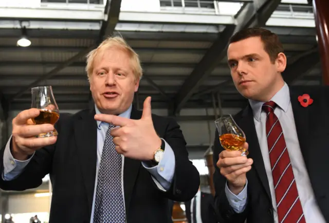 Douglas Ross shares a dram with Boris Johnson in November