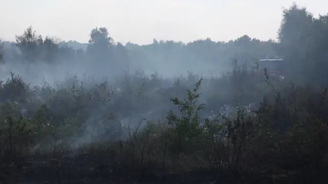 A fire engine tackling the blaze