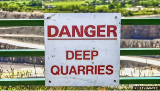 A warning sign at a quarry