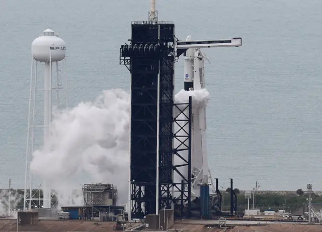 SpaceX rocket and capsule at launchpad