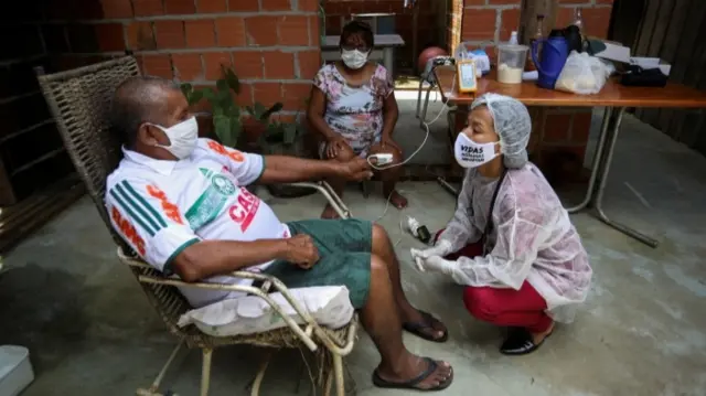 Nurse talking to patient