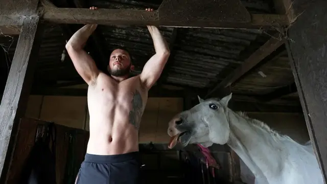 Team GB gymnast Dominick Cunningham trains at a horse stable