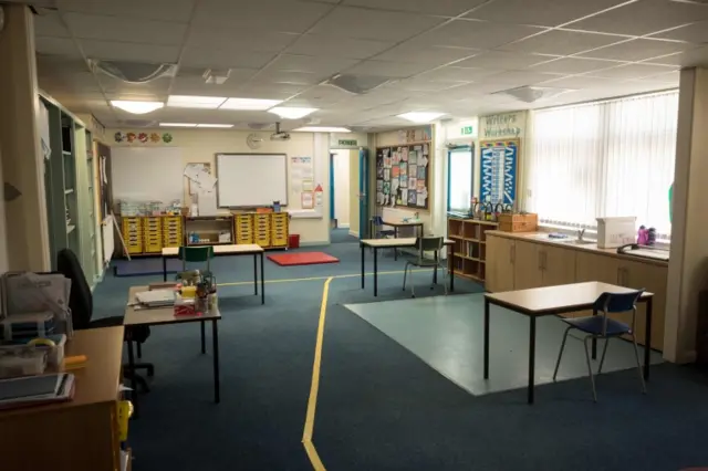 A classroom is seen, which has been rearranged with seating separated by 2m to create an environment safe from Coronavirus for pupils and teachers at Slaithwaite C of E Junior and Infant School in Slaithwaite