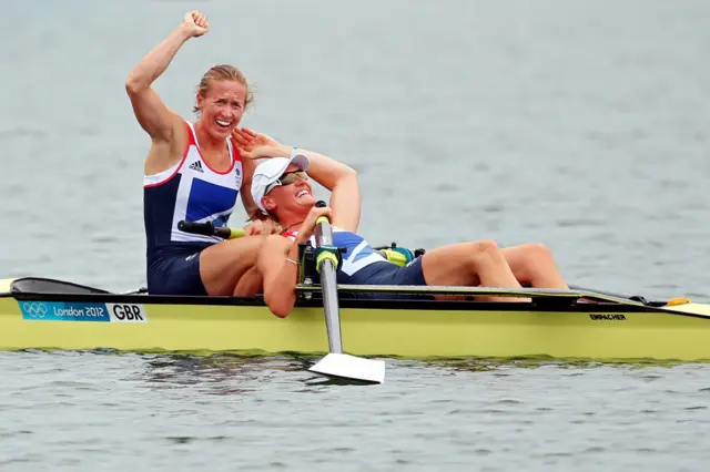 Heather Stanning and Helen Glover celebrate in their boat