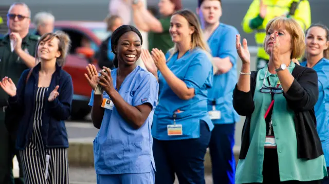 NHS workers join in the clapping