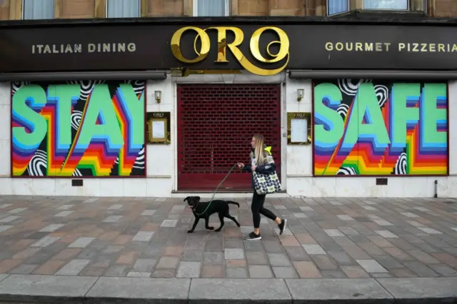 A restaurant with its shutters down