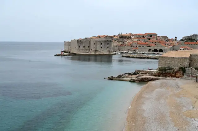 Banje beach in front of old town of the southern Croatian city of Dubrovnik