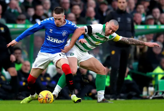 Rangers' Ryan Kent and Celtic's Scott Brown