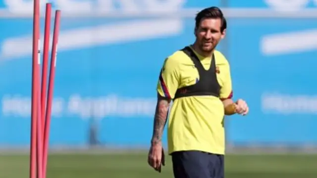 Lionel Messi trains with his Barcelona team-mates