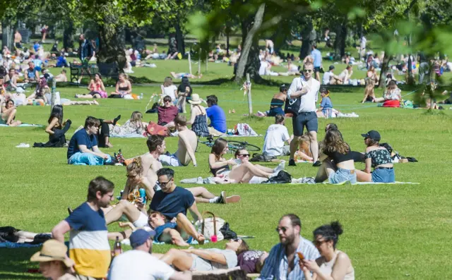 Crowds in The Meadows in Edinburgh