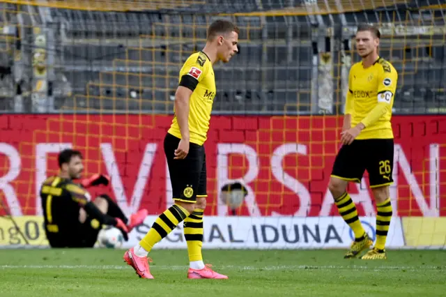 Borussia Dortmund's players react after losing to Bayern Munich