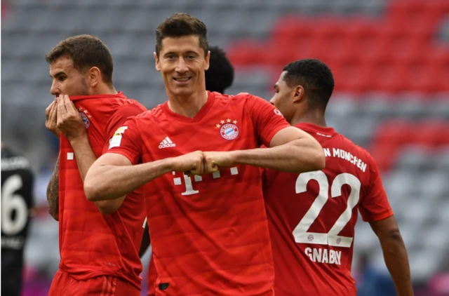 Robert Lewandowski celebrates after scoring for Bayern Munich