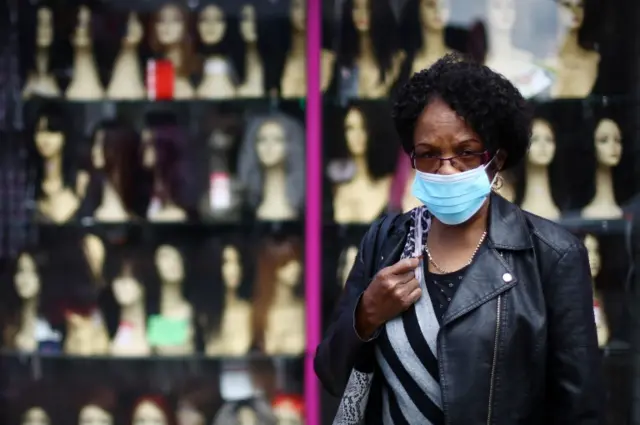 A woman wearing a face mask in London