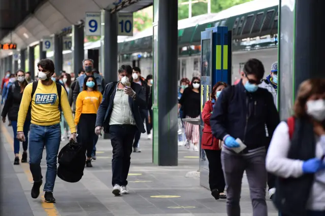 Commuters in Milan after lockdown measures are eased, 4 May 2020