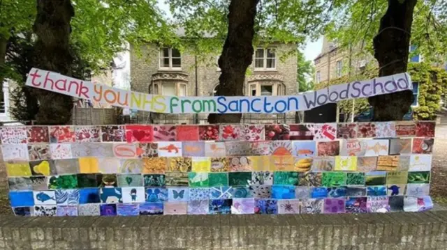 Rainbow artwork outside a school