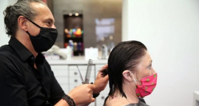Hairdresser and customer