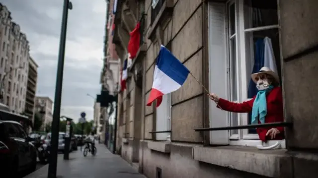 Person waving French flag