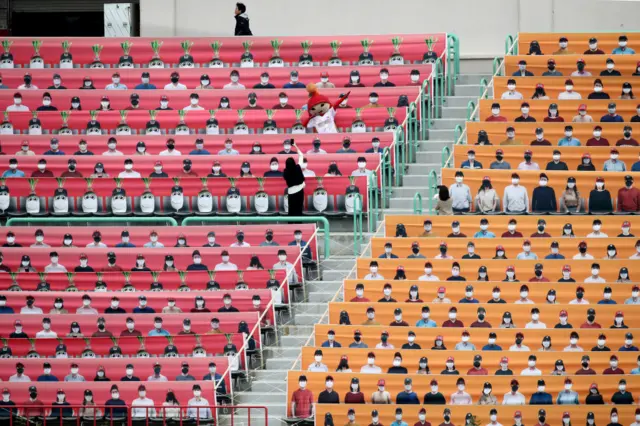Pictures of fans are placed in the stands at SK Wyverns' Happy Dream Ballpark