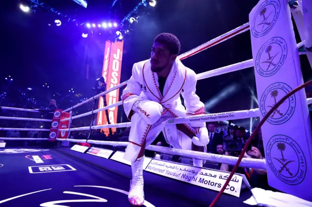 Anthony Joshua enters the ring