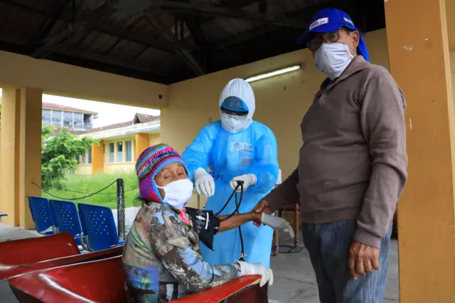 A old woman being treated in Iquitos, Peru