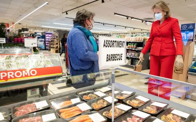 Queen Mathilde of Belgium visits a Carrefour supermarket in Belgium