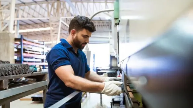 A worker in an industrial setting