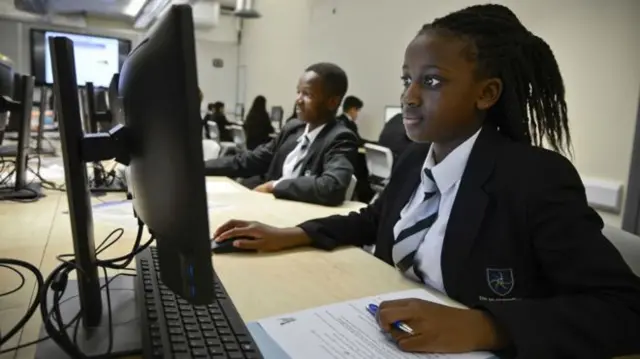 Child using school computer