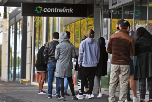 Queue of people outside welfare office in Sydney