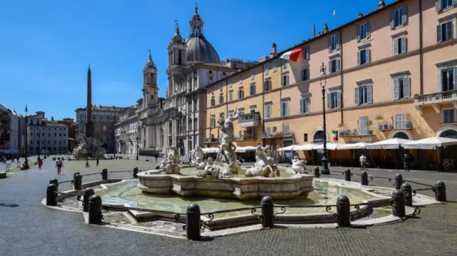 Piazza Navona almost empty, attended only by few residents, and without tourists due to the Coronavirus pandemic on April 30, 2020 in Rome, Italy