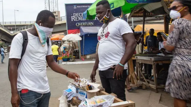 A man sells face masks in Accra, Ghana on 20 April 2020