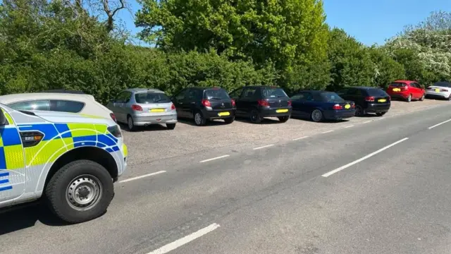 Cars parked at Thornton Reservoir