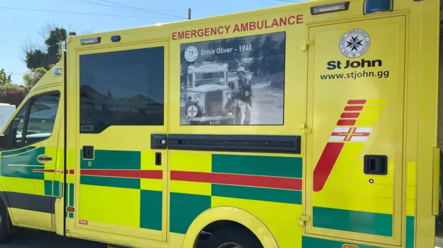 Ambulance with a picture of a WWII ambulance on side.