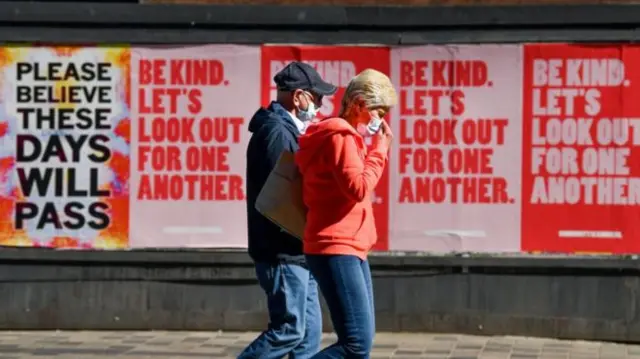 Couple in masks