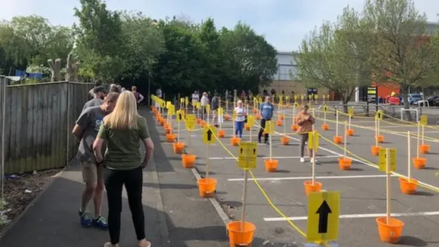 queues outside a B&Q branch