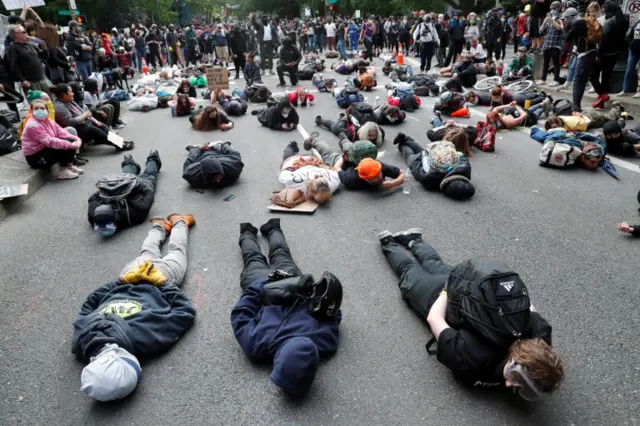 Protesters on the ground chant "I can"t breathe" at a rally in Portland, Oregon. Photo: 31 May 2020