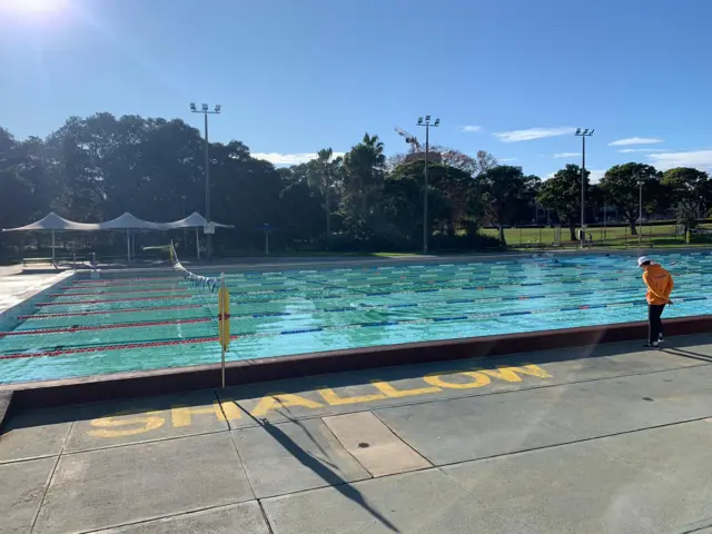 A lifeguard looks out over Sydney's Victoria Park Pool