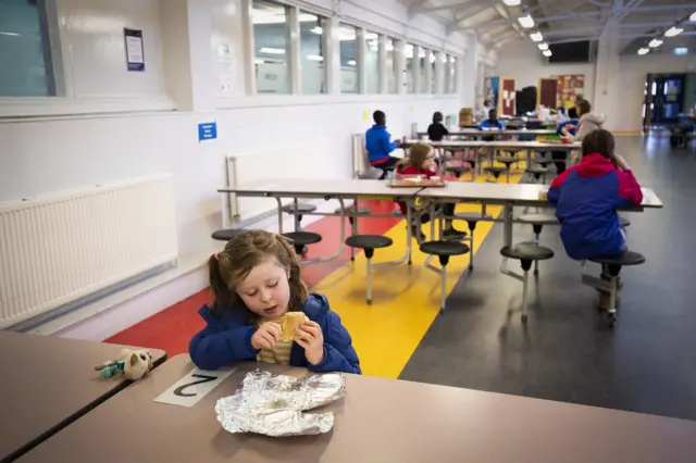 Child in school canteen